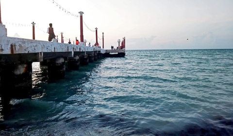 Fallece turista al intentar clavado en el puerto de Sisal